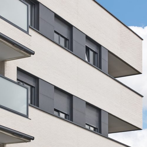 New building exterior facade with terrace. Construction. Buy, rent